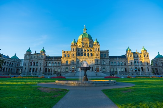 beige concrete building under blue sky during daytime in British Columbia Canada