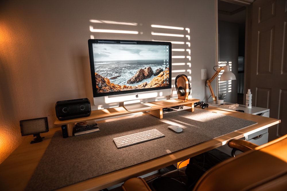 black flat screen tv on brown wooden table