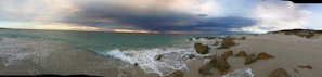 A panoramic view of Pernambuco’s coastline with waves crashing on the shore