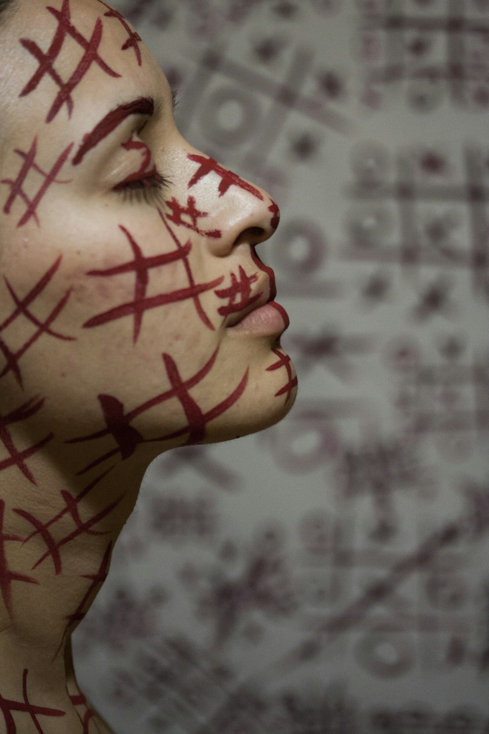 woman with red and black face paint