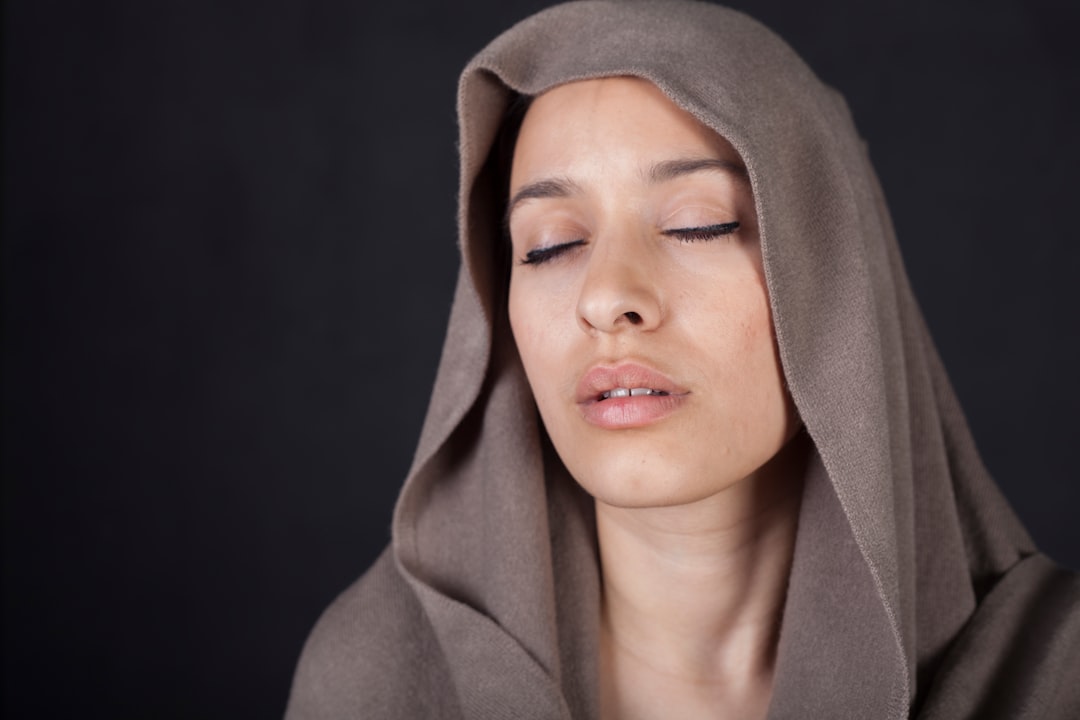 woman in gray hoodie with gray eyes