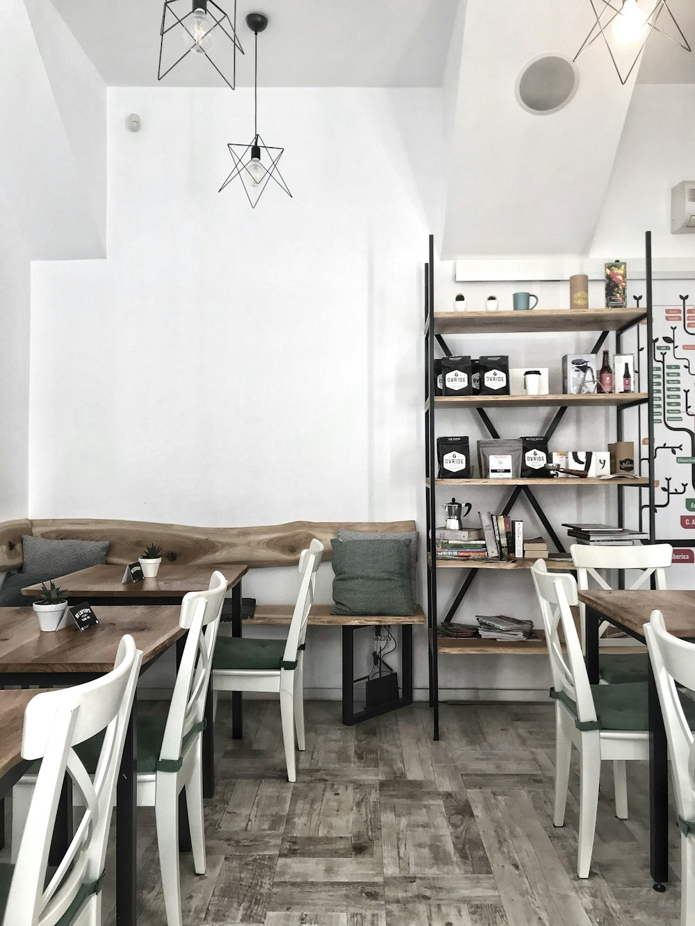 white wooden chairs and table