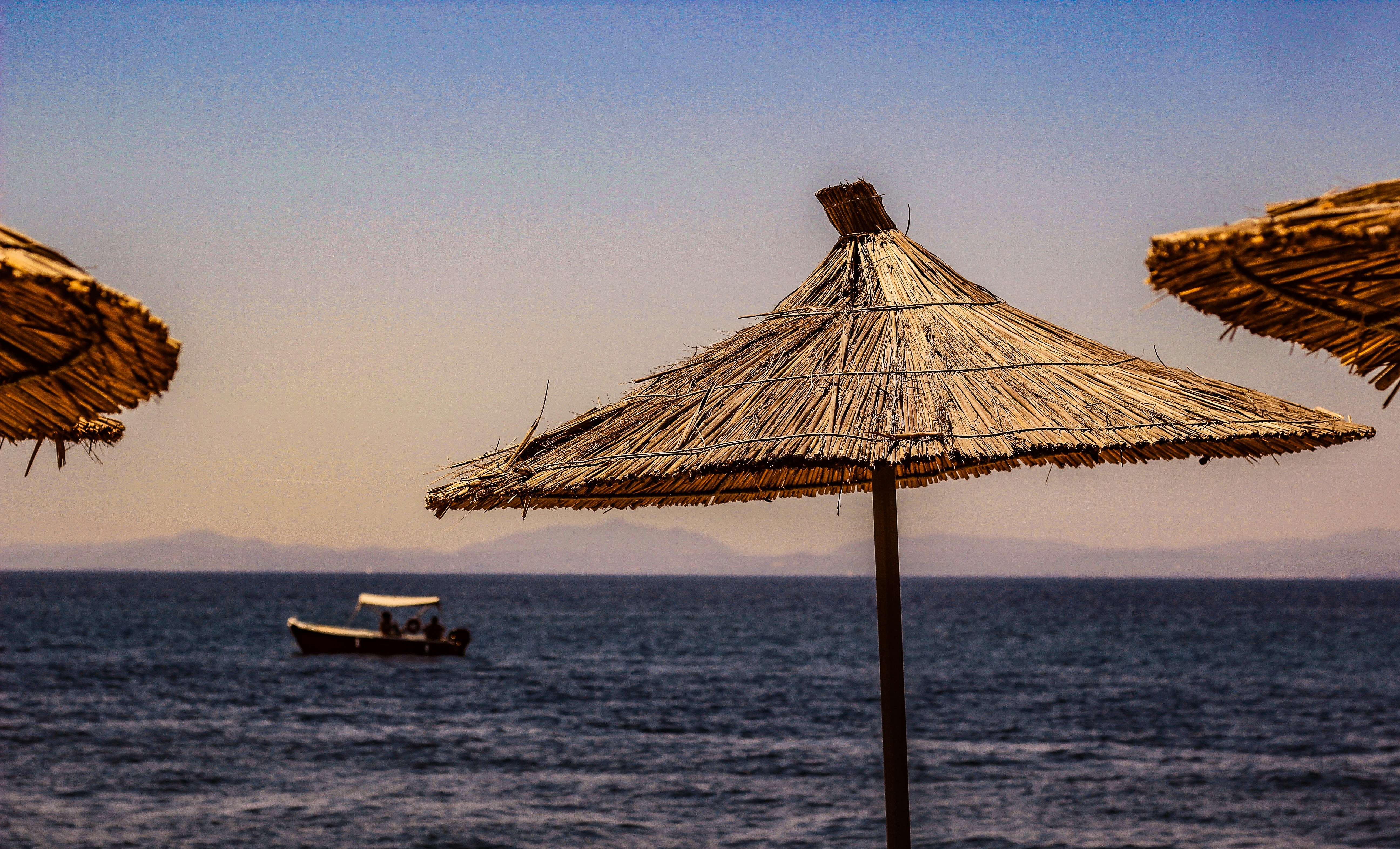 brown wooden boat on sea during daytime, Craving summer 1