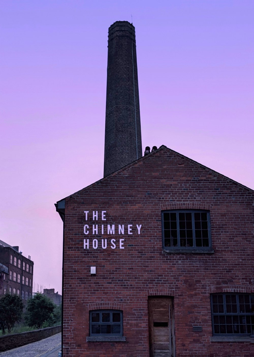 brown brick building with tower