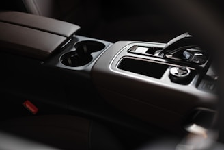 A sleek car organizer showcasing a modern black-and-silver design.