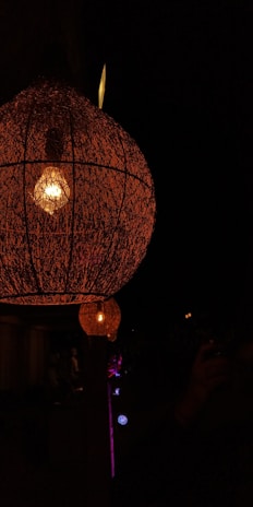 Close-up of a premium artisanal lamp showcasing intricate craftsmanship and warm light.