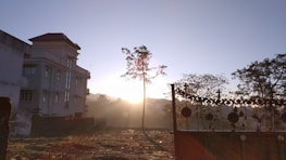 Government building exterior at sunrise.