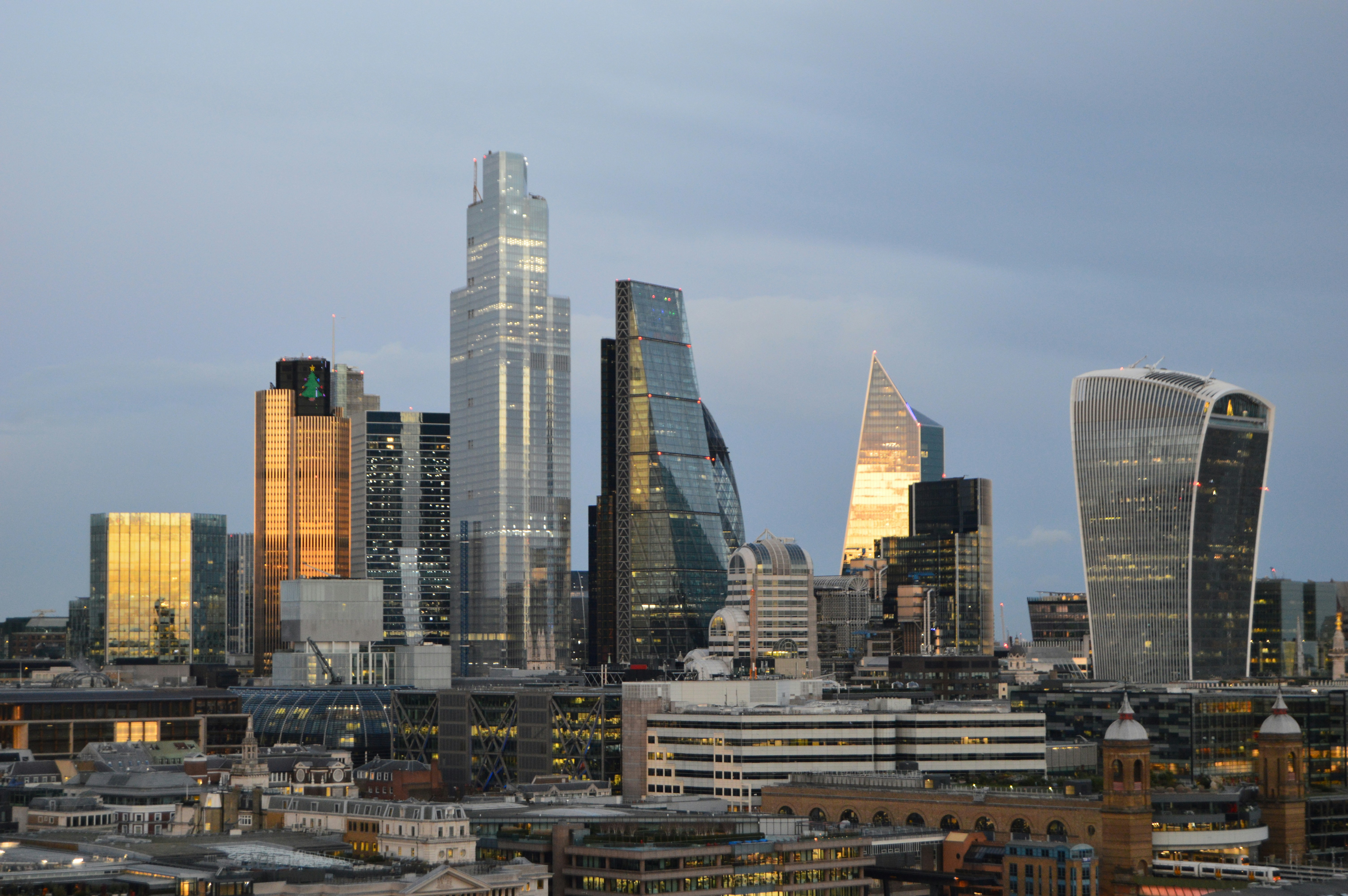 Sofia Bulgaria city skyline at dusk, modern buildings, city lights, blue hour
