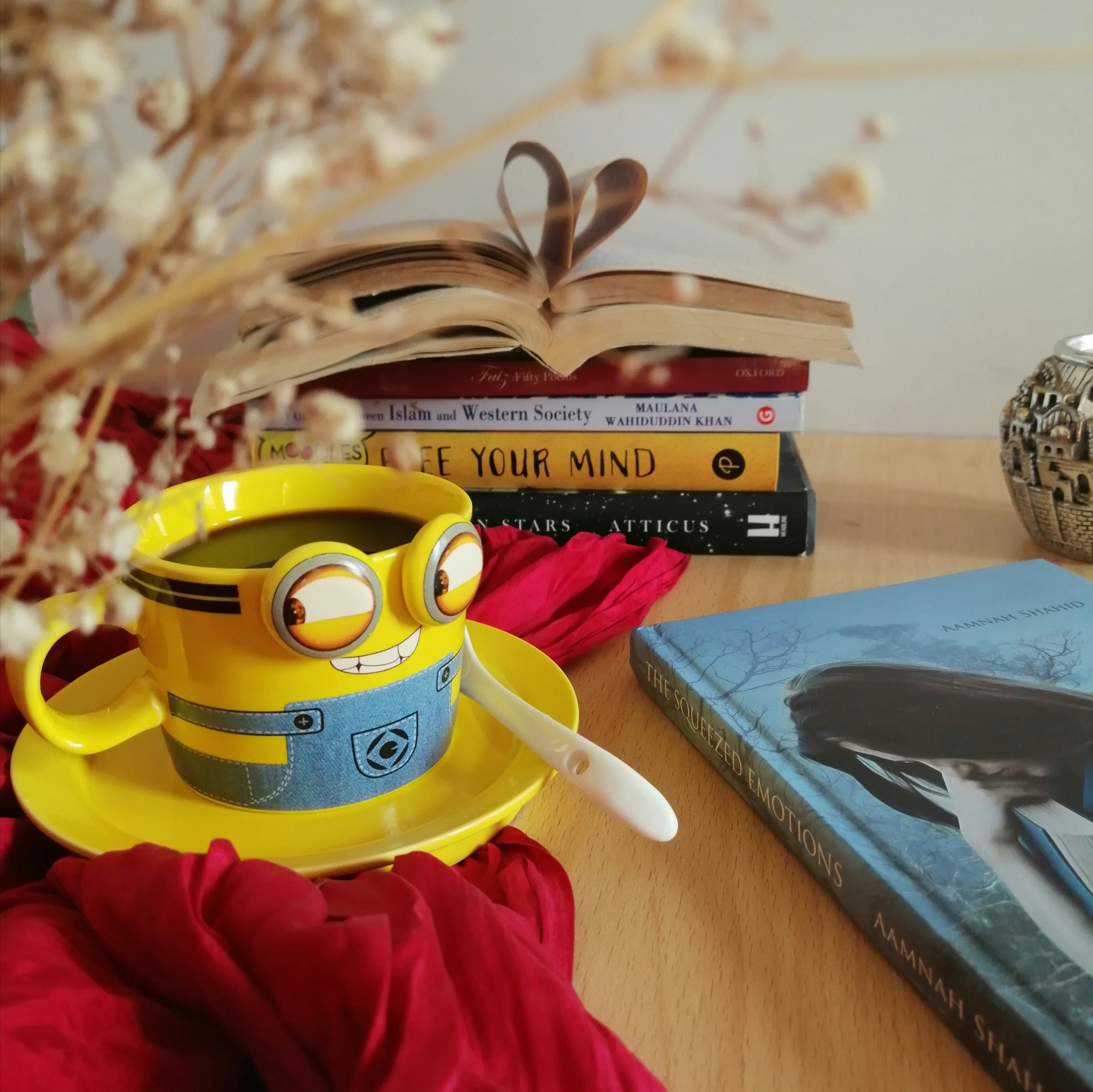minion figurine on brown wooden table