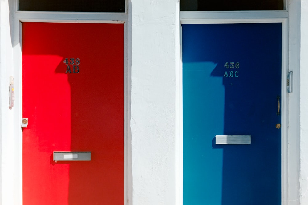 red and blue door with number