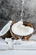 white round cake with white cream on brown wooden round tray