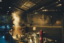 stainless steel cooking pots on stove