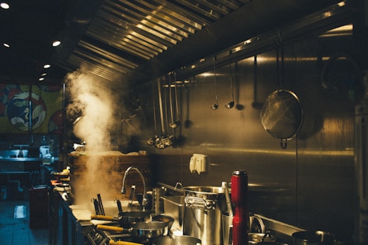 stainless steel cooking pots on stove