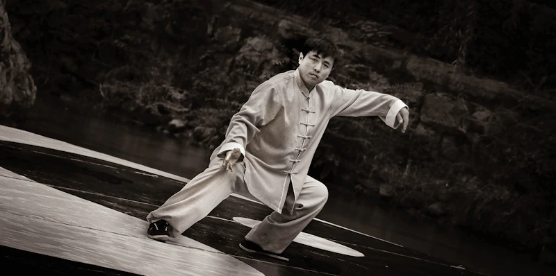 Master in traditional robes in quiet meditation