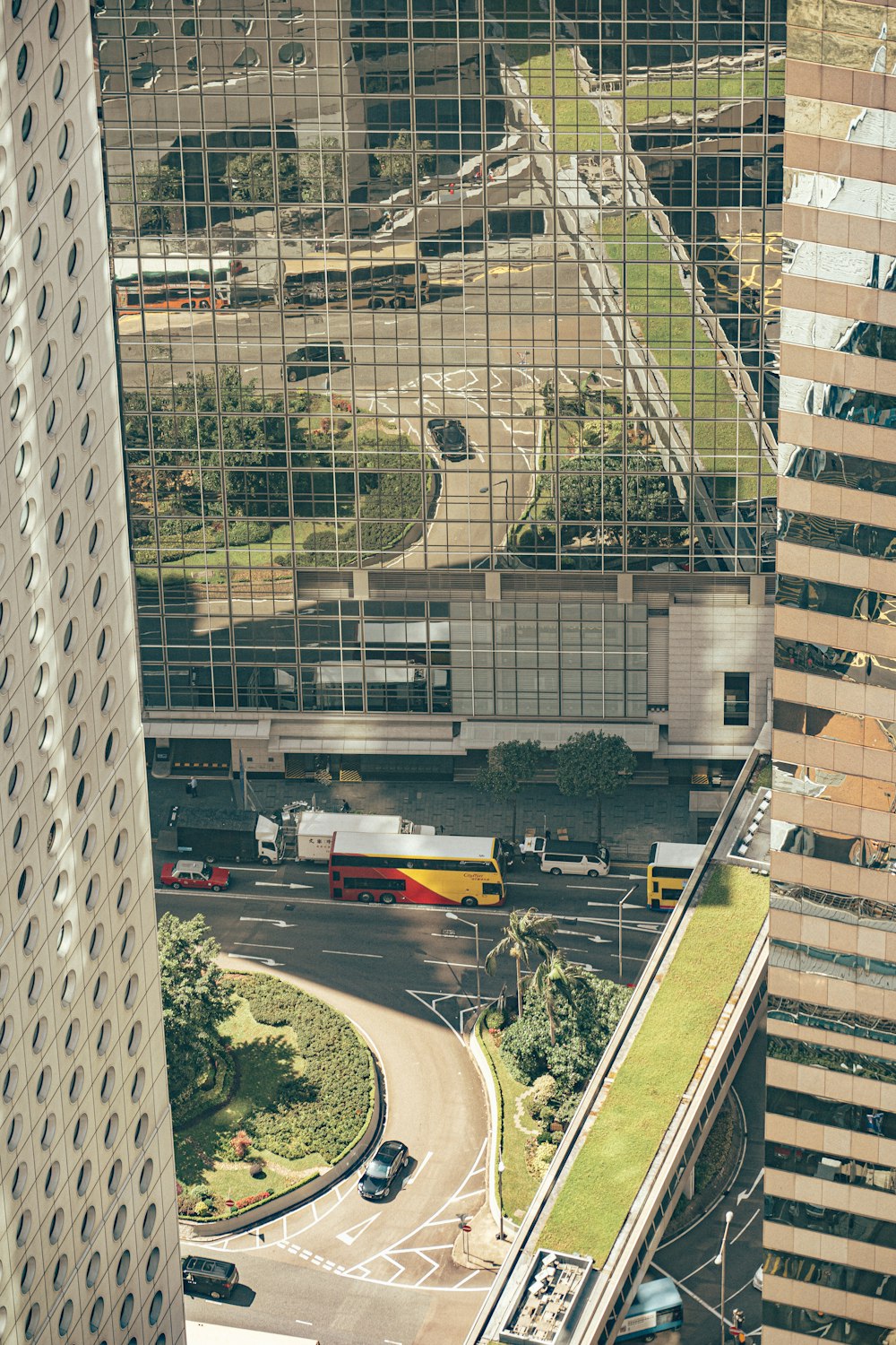 white and red bus on road during daytime