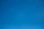 A clear and cloudless bright blue sky