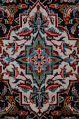 red white and black floral textile