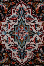 red white and black floral textile