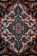 red white and black floral textile