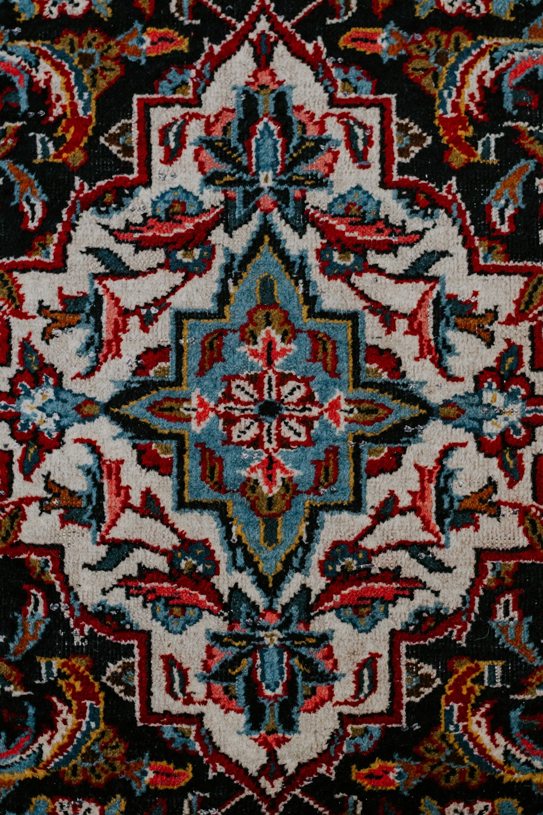  red white and black floral textile rug