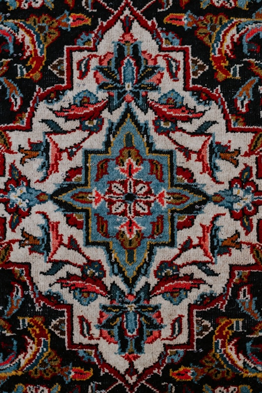 Minimalist rug with abstract terracotta and cream geometric shapes