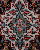 red white and black floral textile