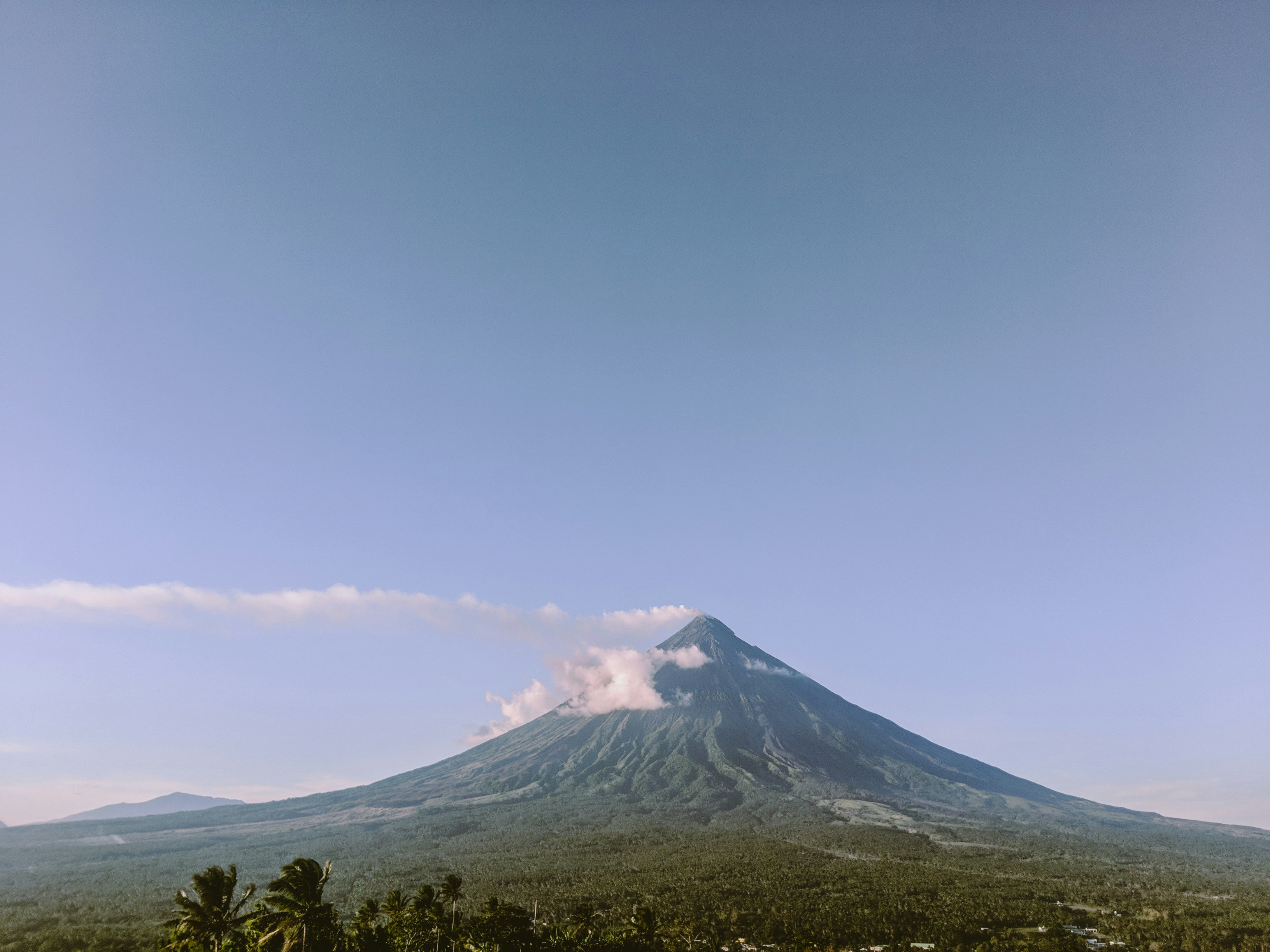 snow covered mountain under blue sky during daytime