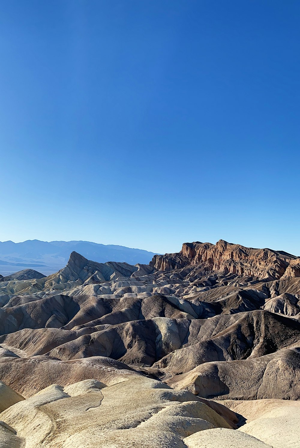 brown and gray rocky mountain under blue sky during daytime