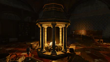 Charming stone fireplace in a warmly decorated room at the medieval inn.