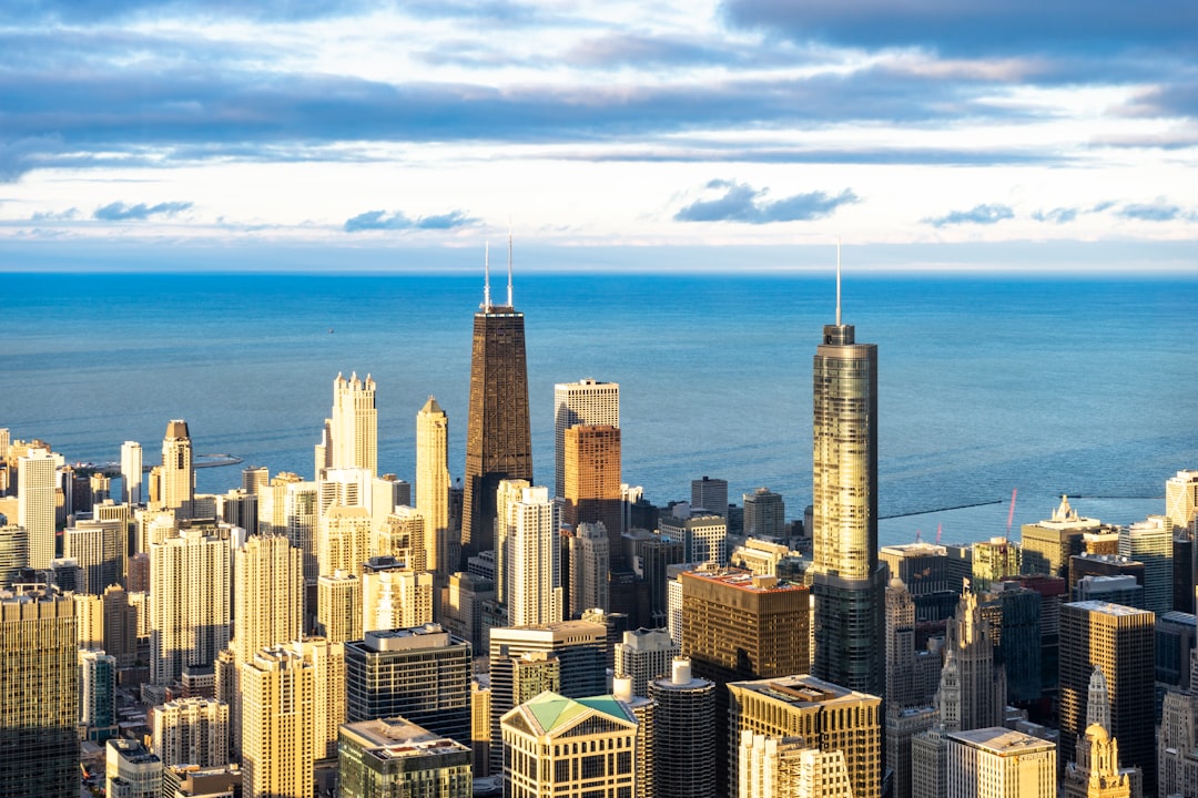 high rise buildings near sea during daytime