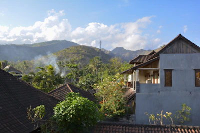 Scenic view of Ajijic lakeside with colorful houses and mountains.