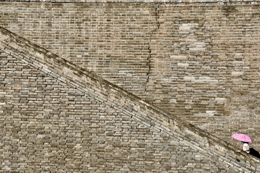 brown and gray brick wall