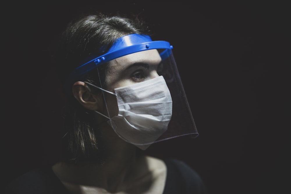 woman in white face mask