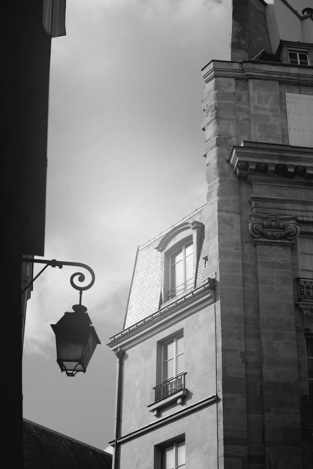 grayscale photo of concrete building