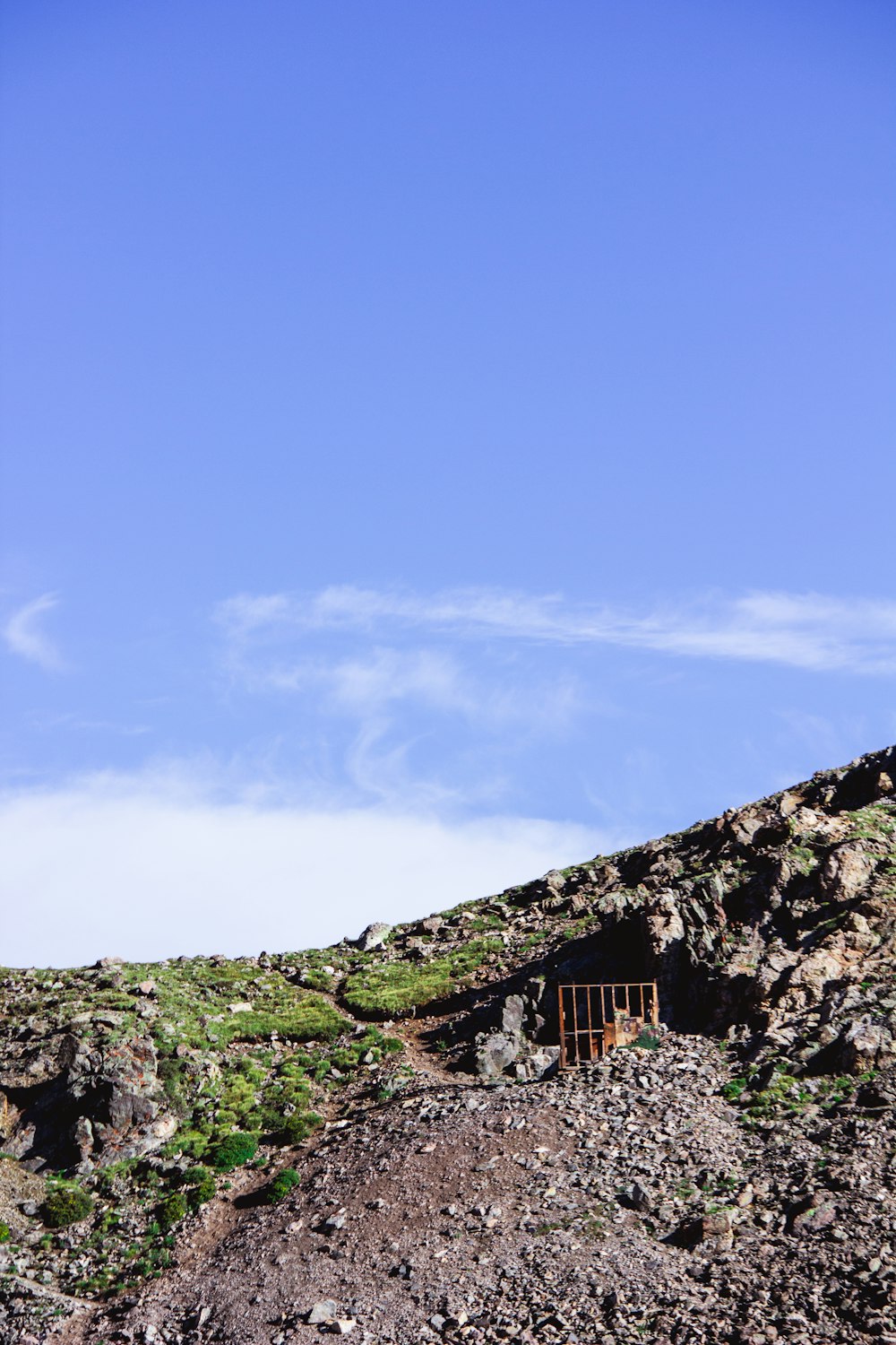 green and brown mountain under blue sky during daytime