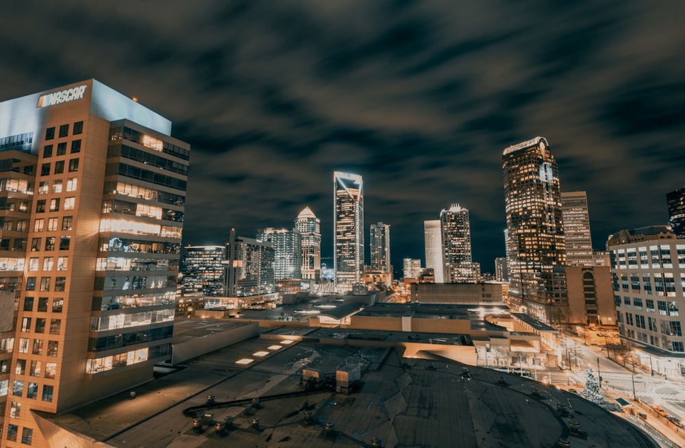 city skyline under gray cloudy sky during daytime