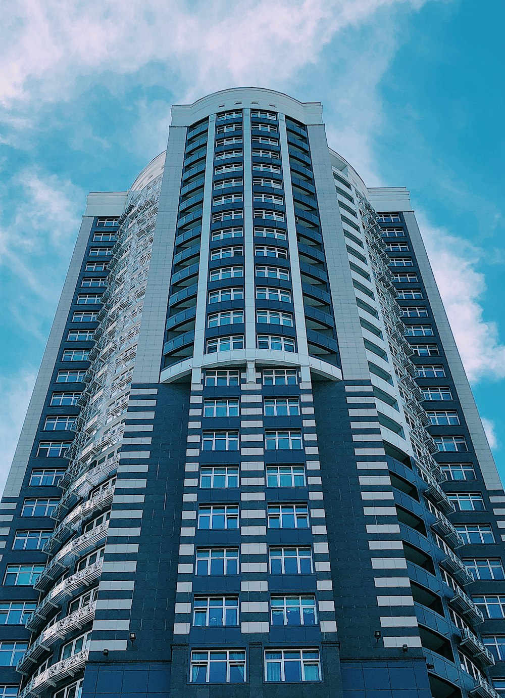 gray concrete building under blue sky during daytime