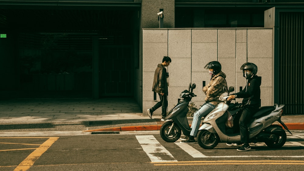 man in black jacket riding on black motorcycle