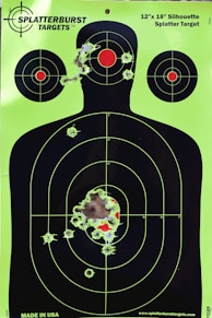 gun targets with bullet holes