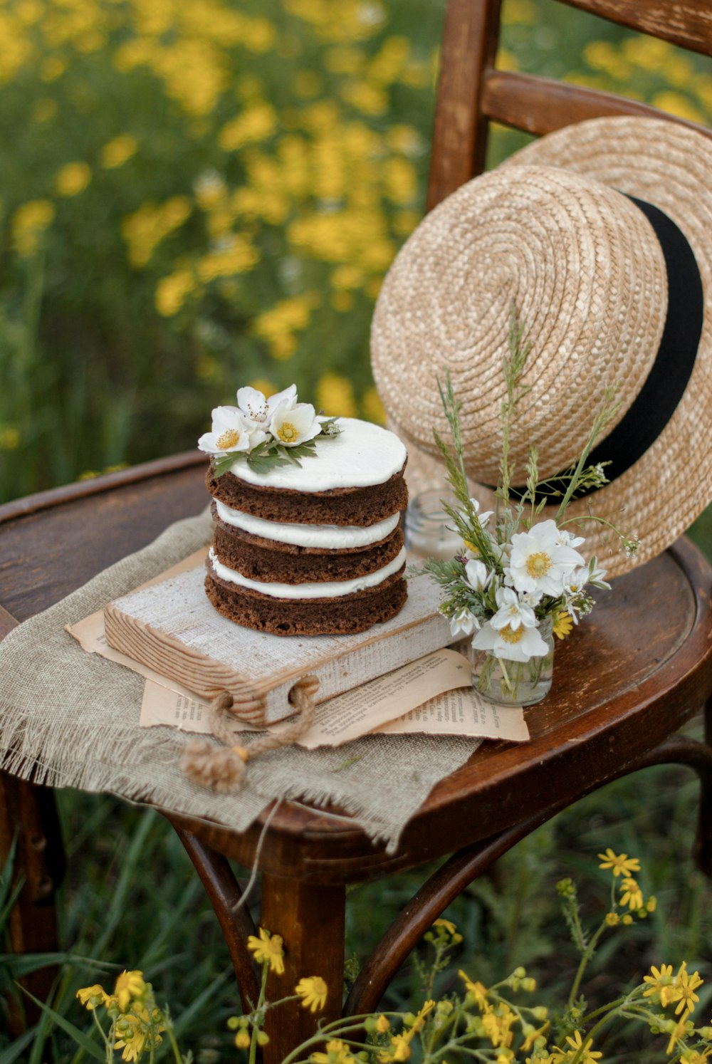 white and brown round hat on brown wooden table