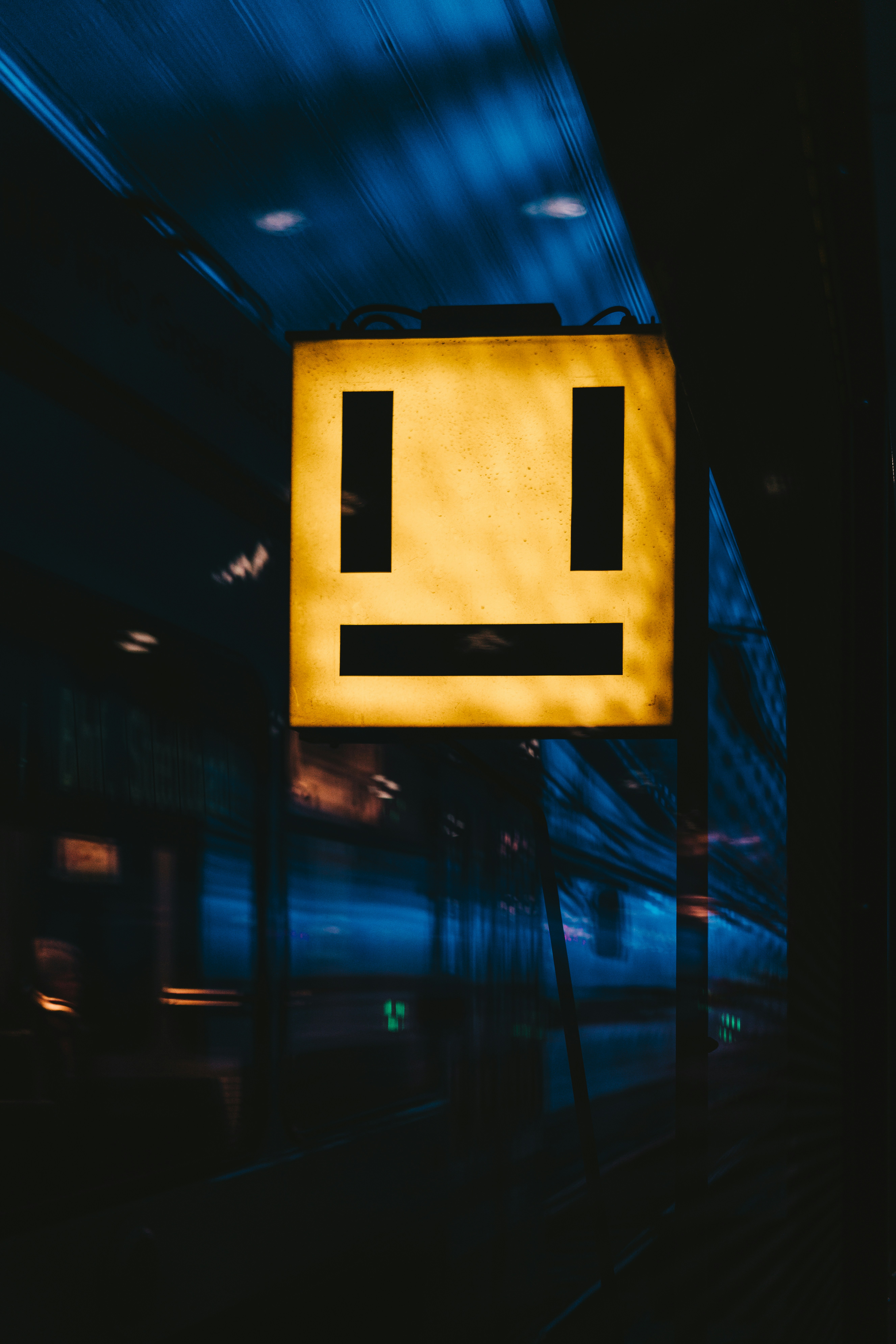 yellow and black lighted signage