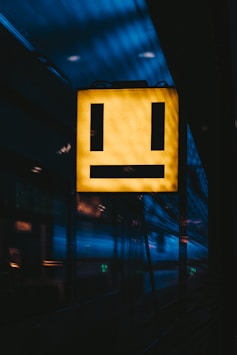 yellow and black lighted signage