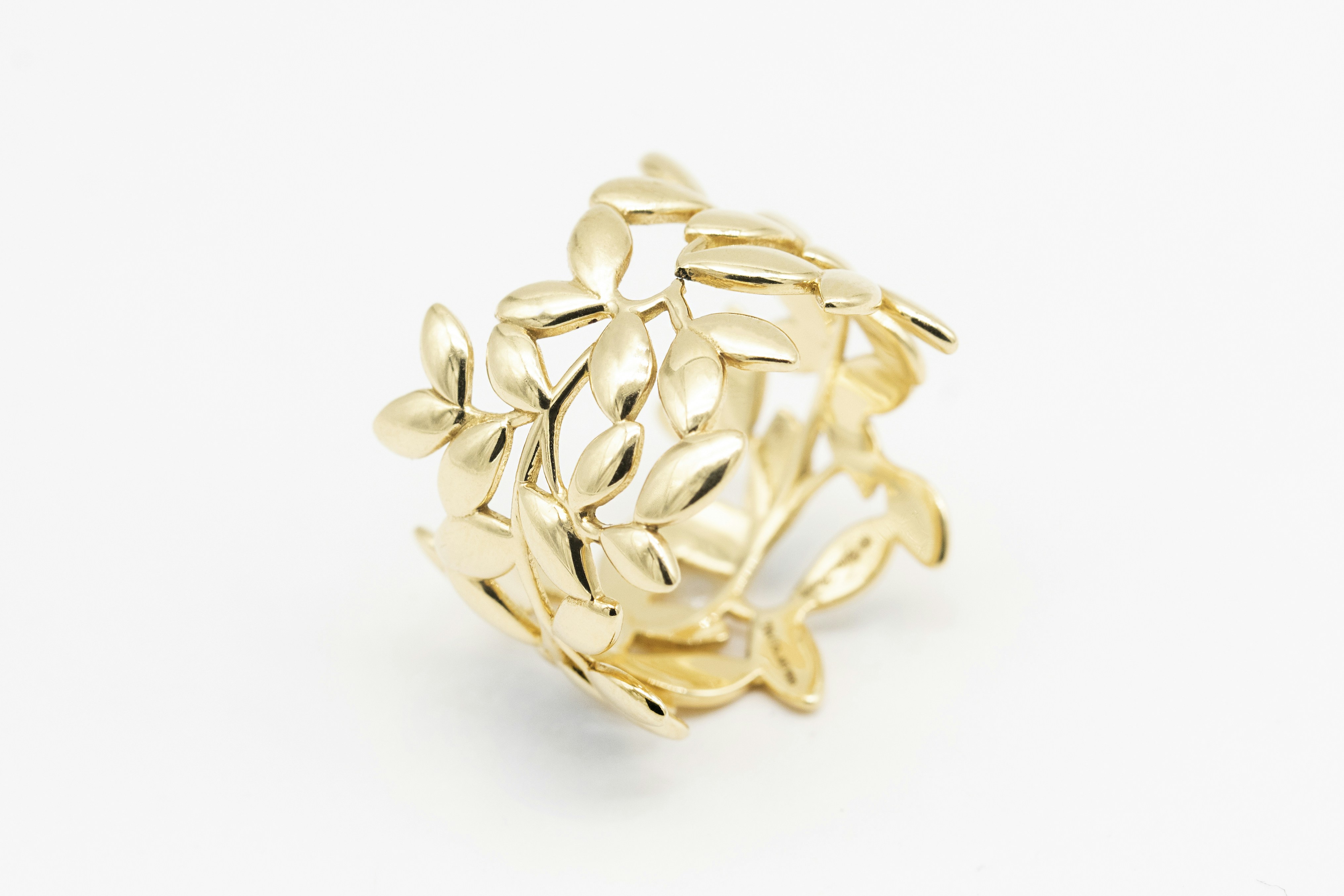 gold and white flower ornament