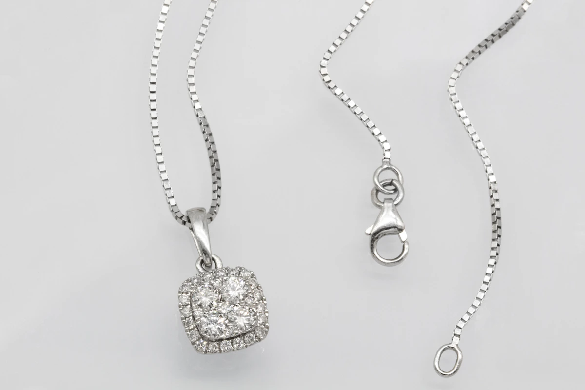 Silver heart pendant necklace on a delicate chain, handcrafted jewellery