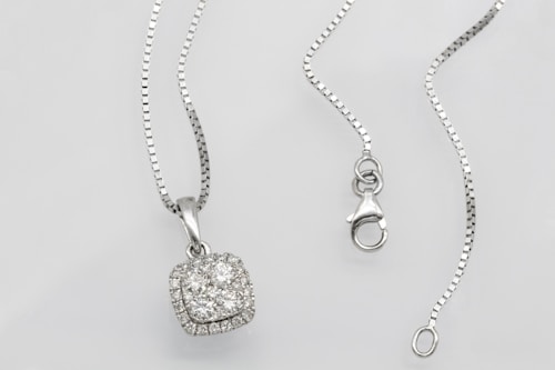 Gold chain necklace with flower pendant