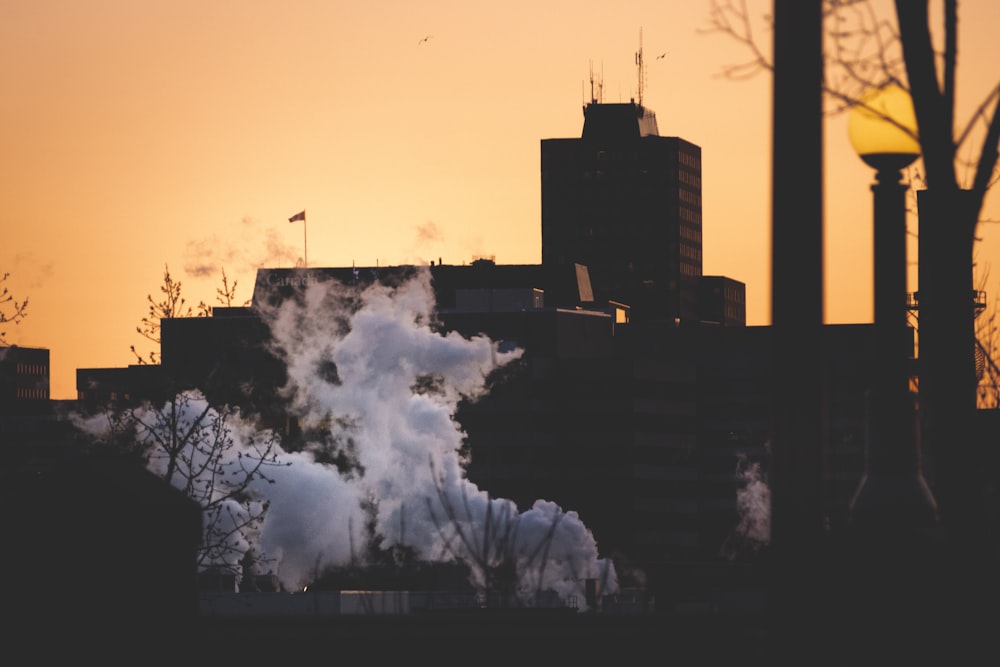 silhouette of building during sunset