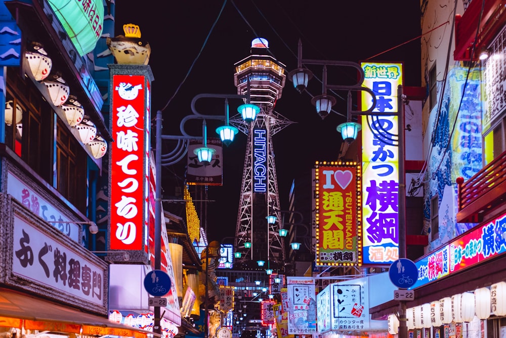 people walking on street during night time