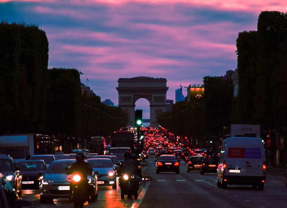 cars on road during sunset