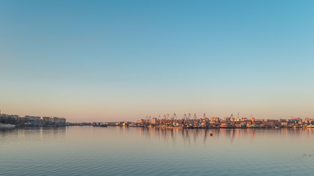 body of water during sunset