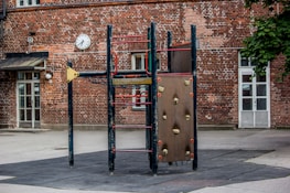 Brightstart Daycare’s outdoor play area with kids climbing and enjoying fresh air.